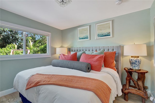 bedroom featuring hardwood / wood-style flooring