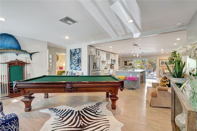 game room featuring light wood-type flooring and pool table