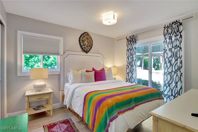 bedroom with light hardwood / wood-style flooring