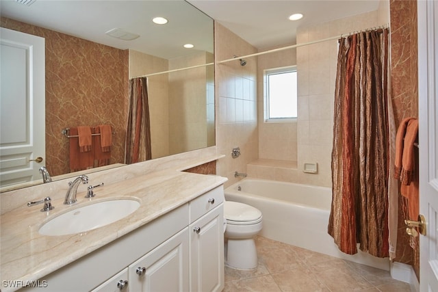 full bathroom with toilet, vanity, shower / bath combo, and tile patterned flooring