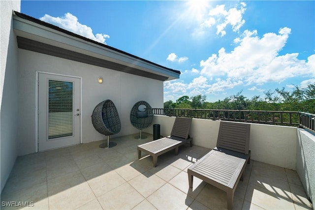 view of patio with a balcony