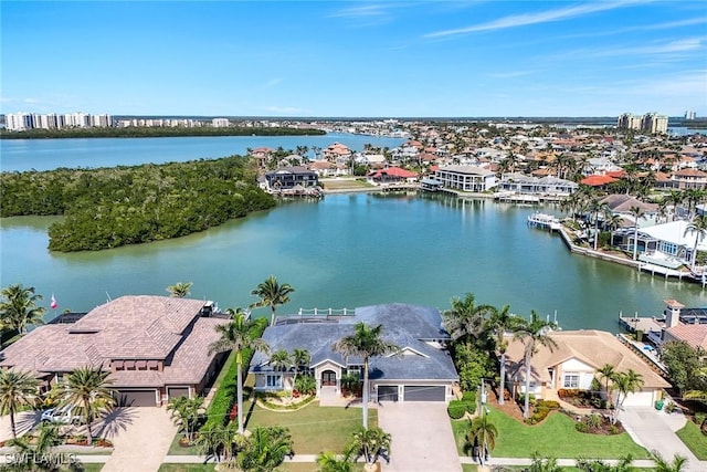 drone / aerial view with a water view