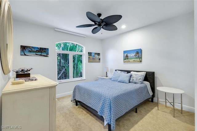 bedroom with light carpet, recessed lighting, ceiling fan, and baseboards