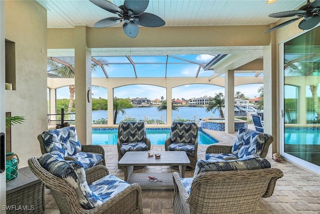 sunroom / solarium featuring wood ceiling, a pool, a ceiling fan, and a water view