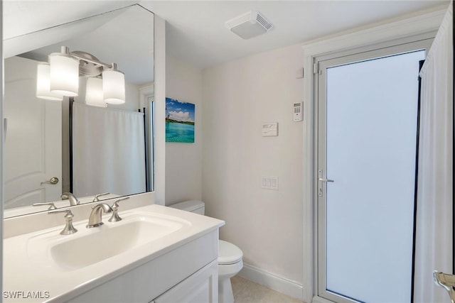 bathroom with visible vents, baseboards, toilet, and vanity