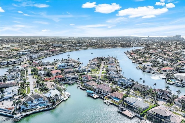 bird's eye view with a residential view and a water view