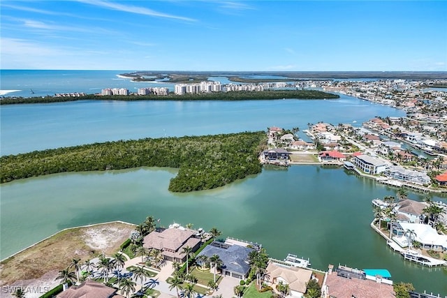 aerial view with a residential view and a water view