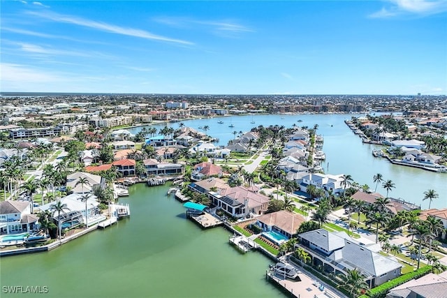 bird's eye view with a water view and a residential view