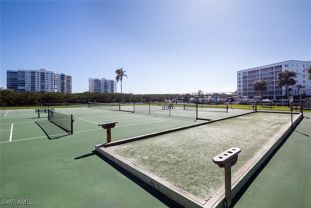 view of sport court featuring basketball hoop