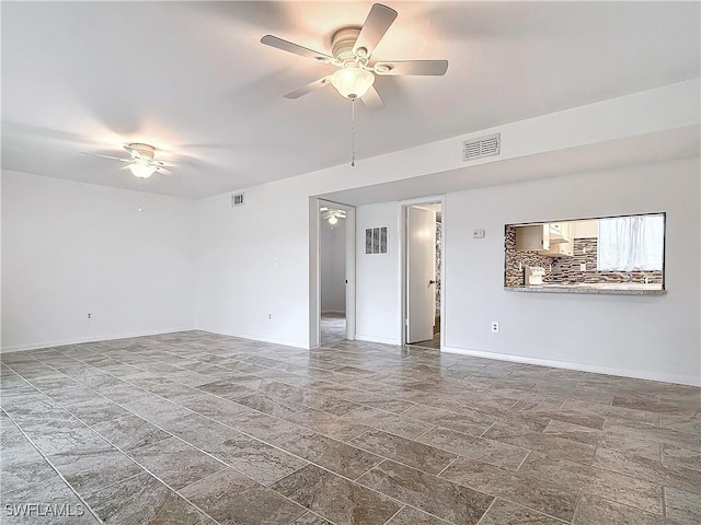 spare room featuring ceiling fan