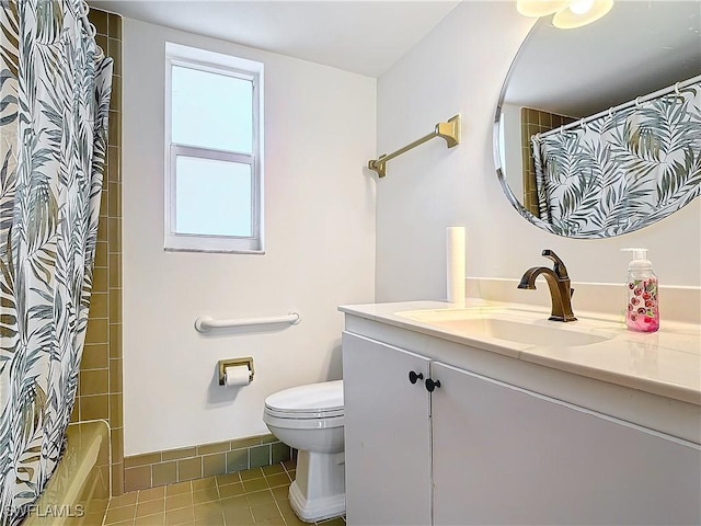 full bathroom featuring toilet, vanity, and shower / tub combo