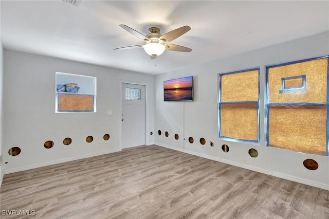 washroom featuring light wood-type flooring and ceiling fan