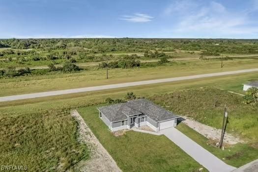 bird's eye view with a rural view