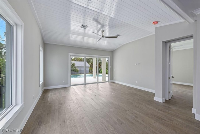 spare room with ceiling fan and dark hardwood / wood-style flooring