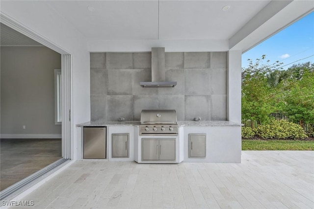 view of patio / terrace featuring area for grilling and an outdoor kitchen