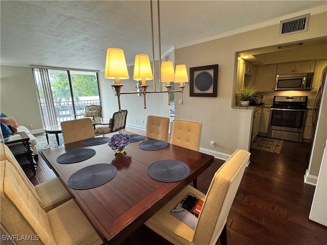 dining space with crown molding and dark wood-type flooring