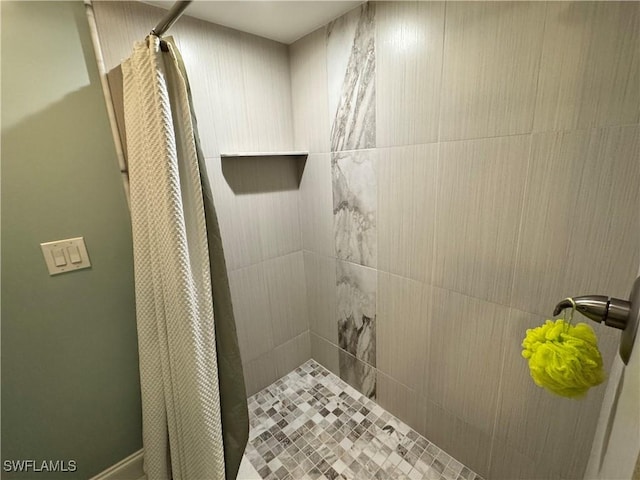 bathroom featuring walk in shower