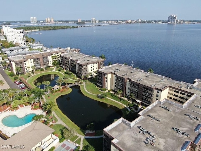 drone / aerial view with a water view