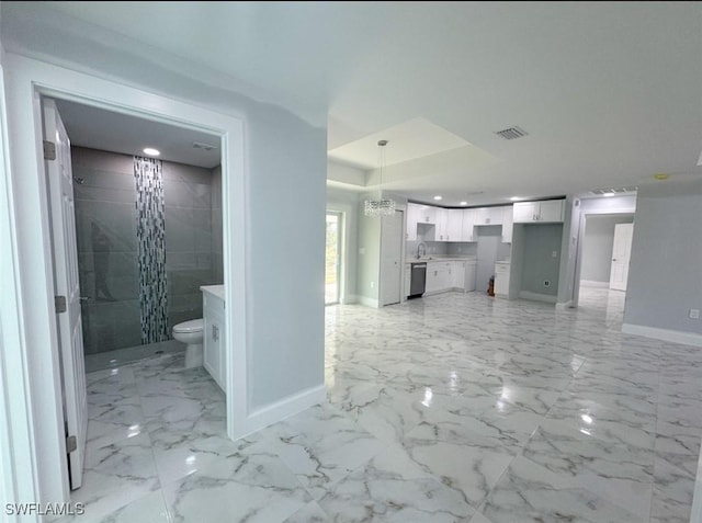 interior space with sink and a chandelier