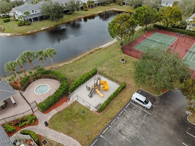 birds eye view of property featuring a water view