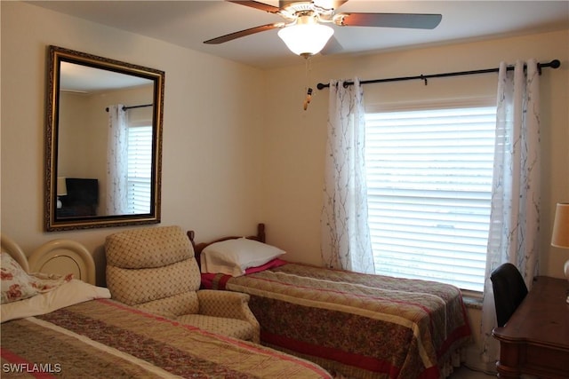 bedroom featuring ceiling fan