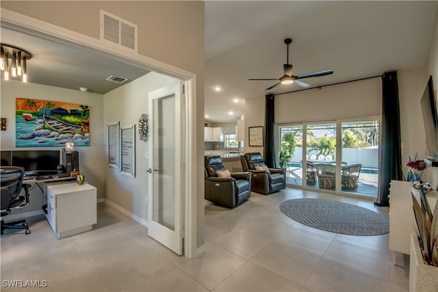 tiled home office with ceiling fan and french doors