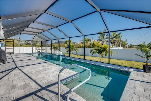 view of pool featuring a lanai and a patio