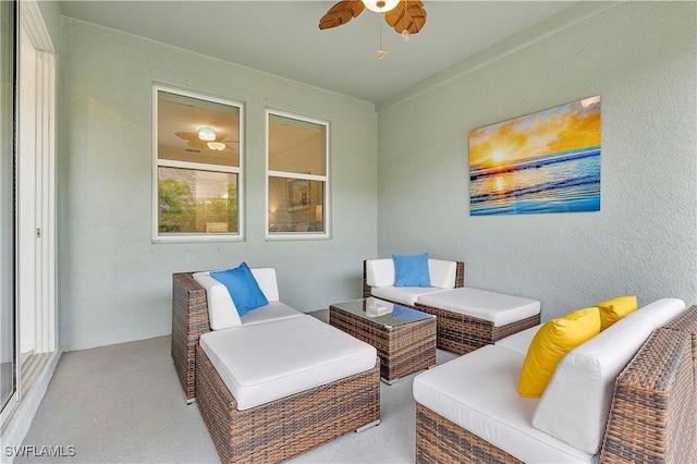 view of patio featuring ceiling fan and an outdoor living space