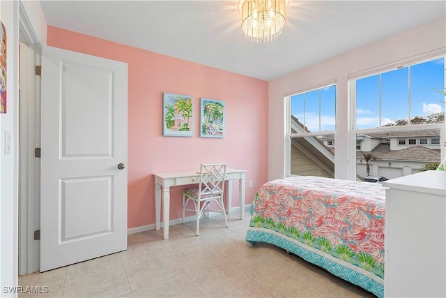 bedroom with a chandelier