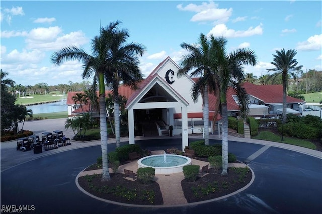 view of building exterior featuring a water view