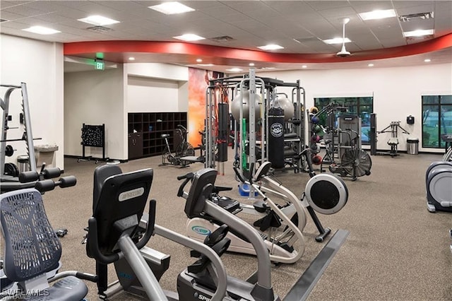 workout area with a drop ceiling