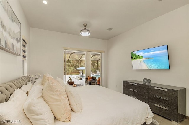 tiled bedroom with access to exterior and ceiling fan