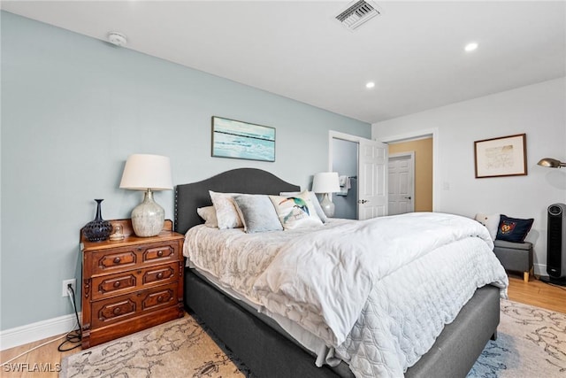 bedroom featuring light wood-type flooring