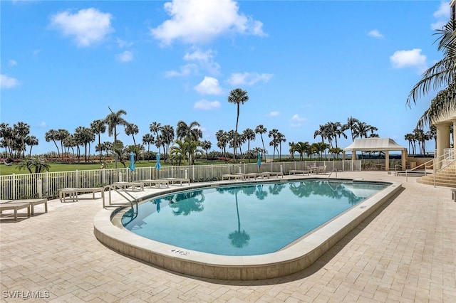 view of pool with a gazebo and a patio area