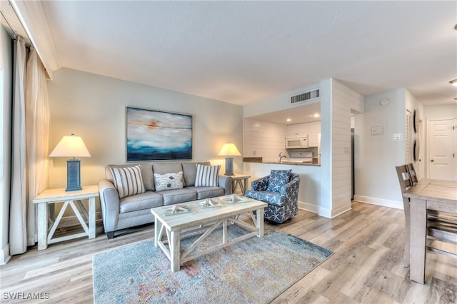 living room featuring light hardwood / wood-style floors