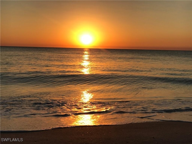 property view of water featuring a beach view