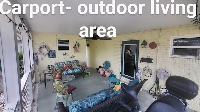 view of patio / terrace featuring ceiling fan and an outdoor hangout area