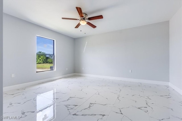 empty room featuring ceiling fan