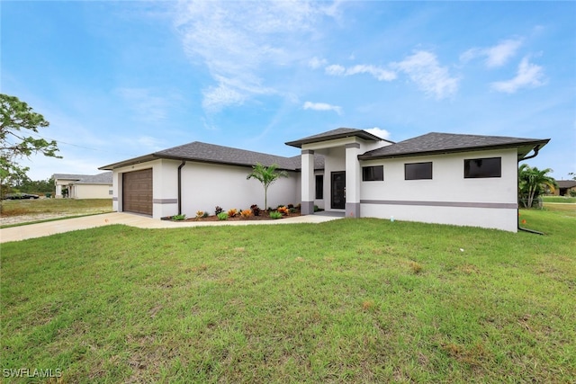 prairie-style house with a front yard and a garage