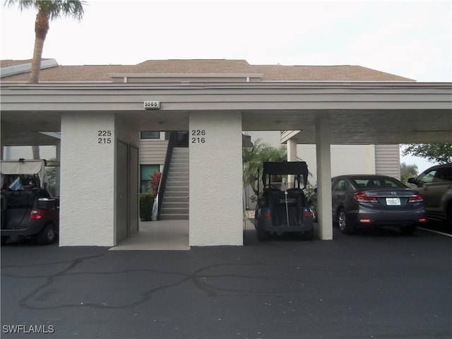 exterior space featuring a carport