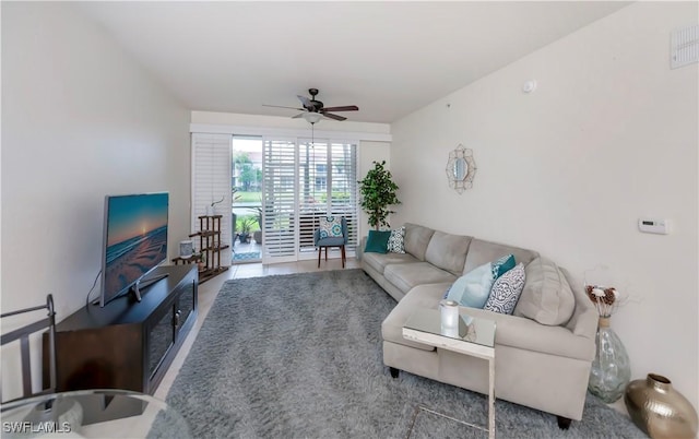 living room featuring ceiling fan