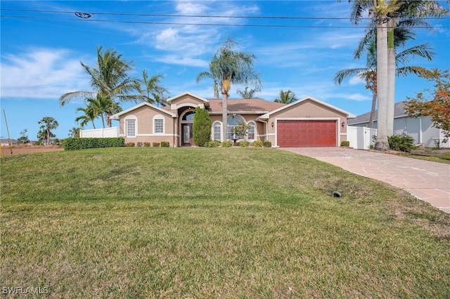 ranch-style house with a garage and a front lawn