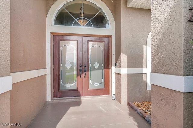 property entrance with french doors