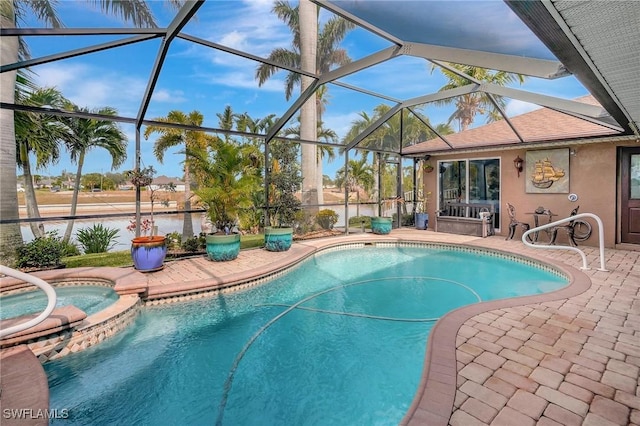 view of pool featuring a patio area and glass enclosure