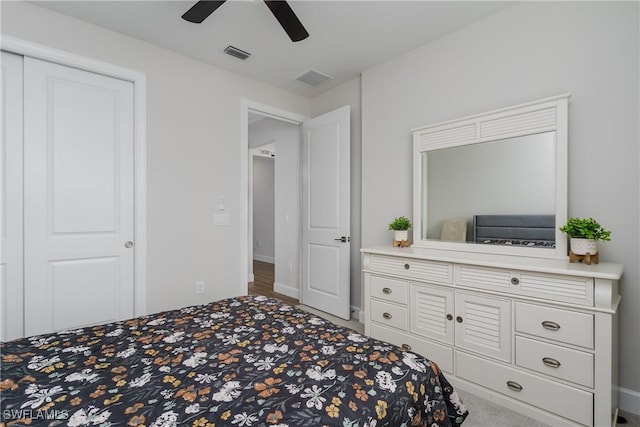 bedroom with carpet flooring, ceiling fan, and a closet