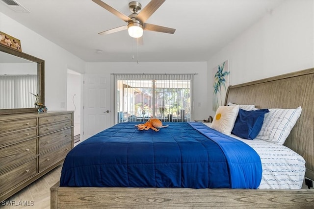 bedroom featuring visible vents and ceiling fan