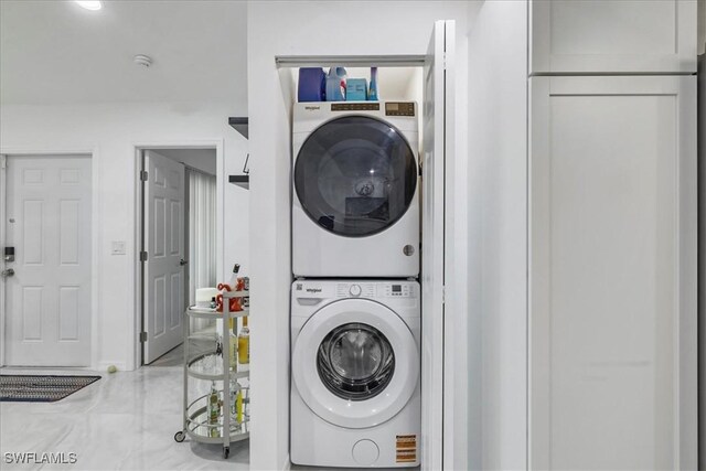 17310 Timber Oak Ln, Fort Myers, FL 33908 - laundry room with stacked washer and clothes dryer