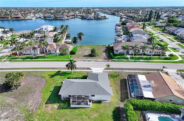 drone / aerial view featuring a water view