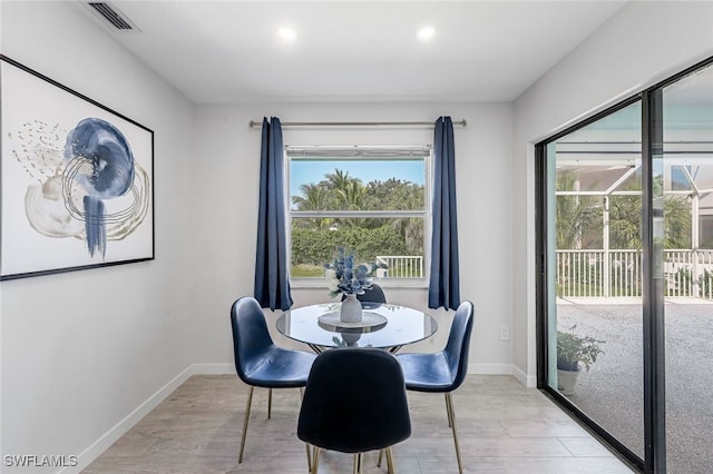 dining room featuring light wood-type flooring