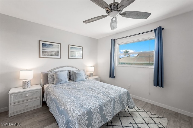 bedroom featuring ceiling fan and hardwood / wood-style floors